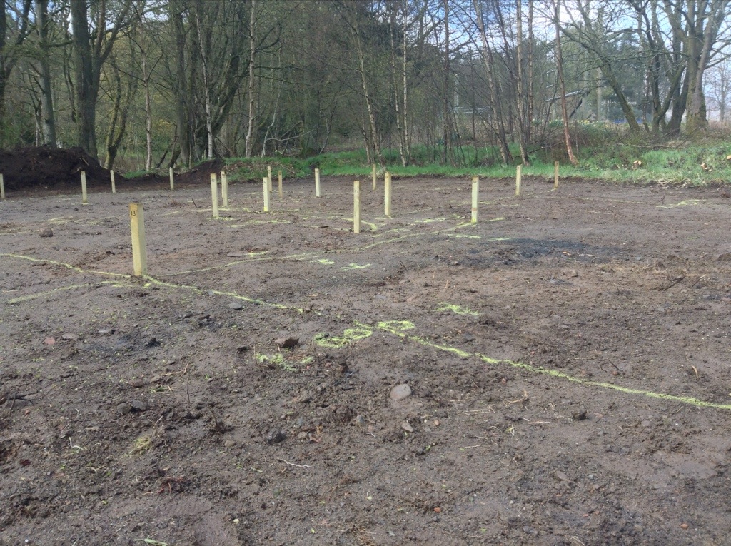 The pegs and markings showing where the foundations will go